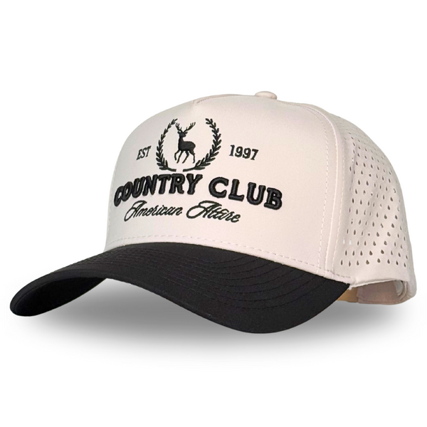Cap with 'Country Club' text and deer logo on a white background