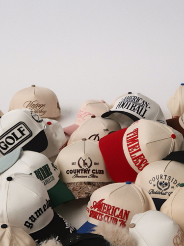 Collection of various Citrusy hats with different designs and text on a light background